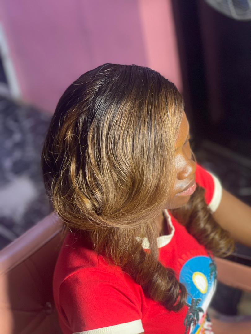 Professional wig installation at Stherline Beauty Home